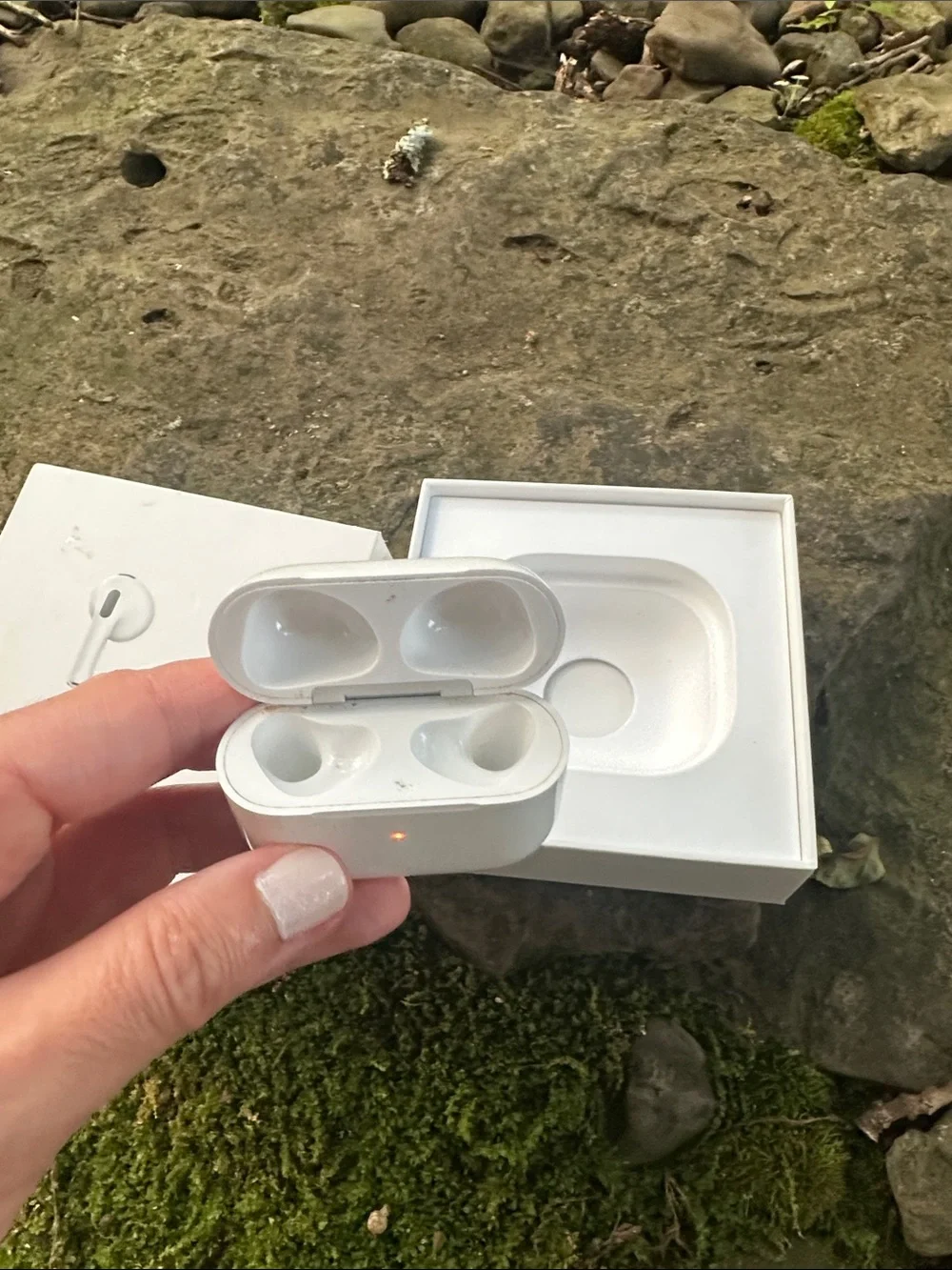 Apple AirPods 3rd generation box and charging case.